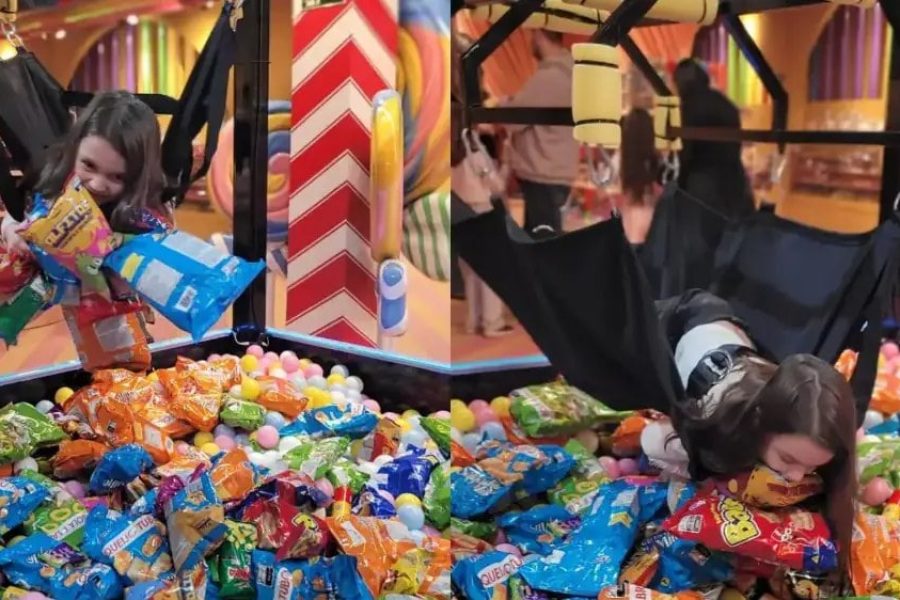 Crianças na Garra Humana da Fabulosa Máquina de Doces, descendo sobre a piscina de bolinhas e salgadinhos em Gramado